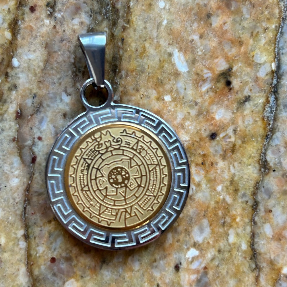 Aztec calendar medallion Fini